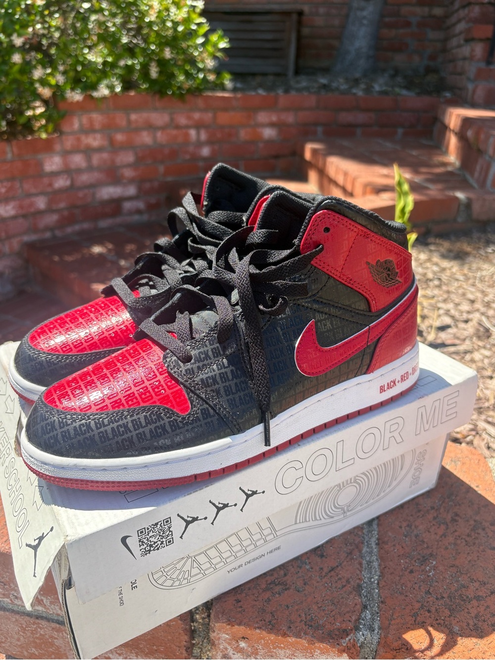 Jordan Retro 1 Mid Kids Black and Red Sneakers